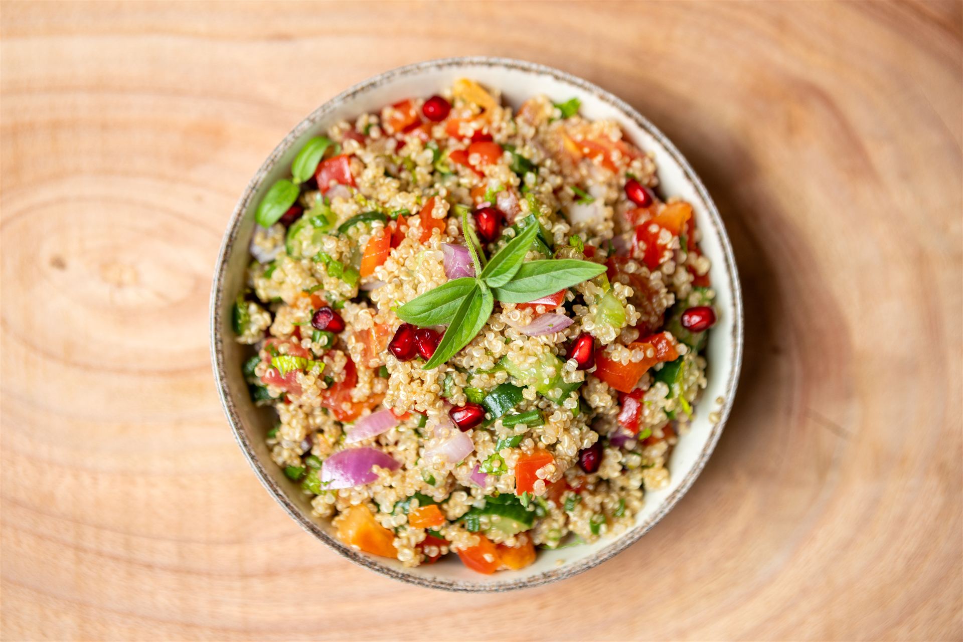 Fresh salad bowl with pomegranate