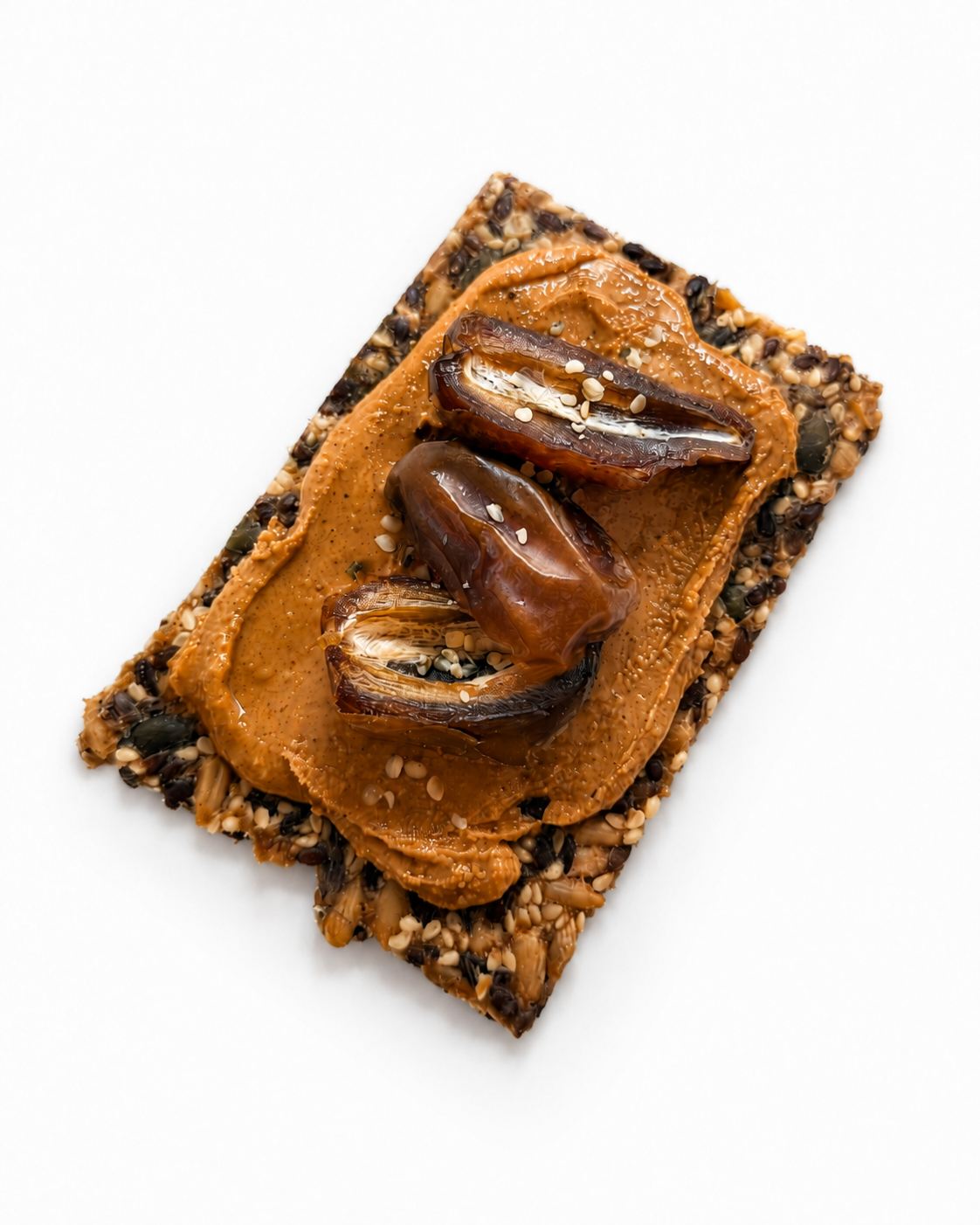 Cracker with peanut butter and dates